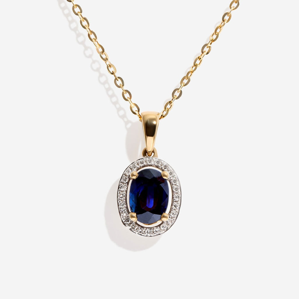 Oval sapphire necklace on white background