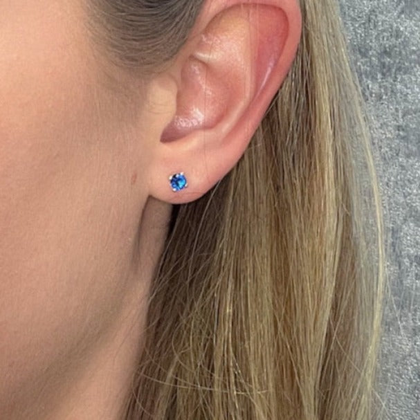 Blue stone ladies gold earrings