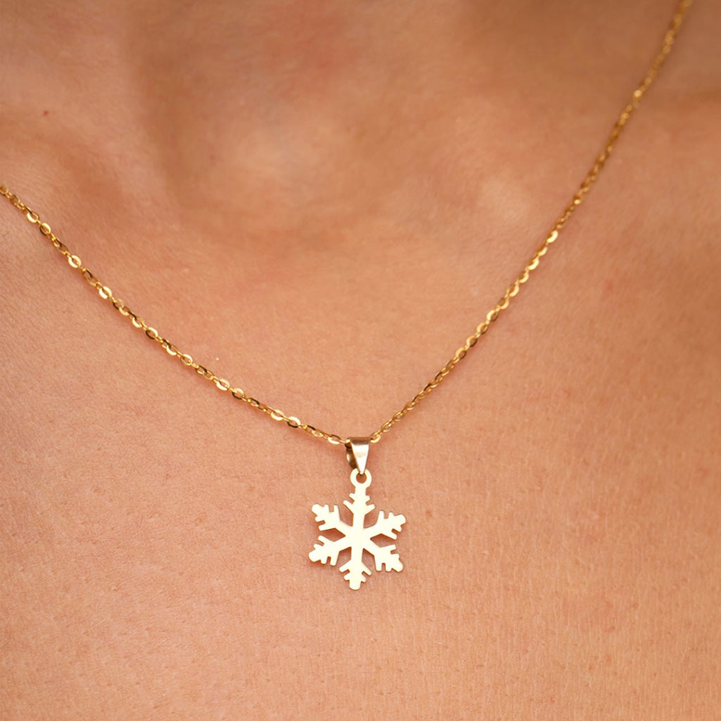 9ct Gold Snowflake Necklace on model
