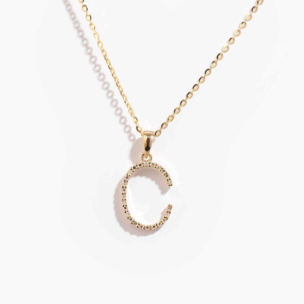 Diamond initial necklace on gold chain