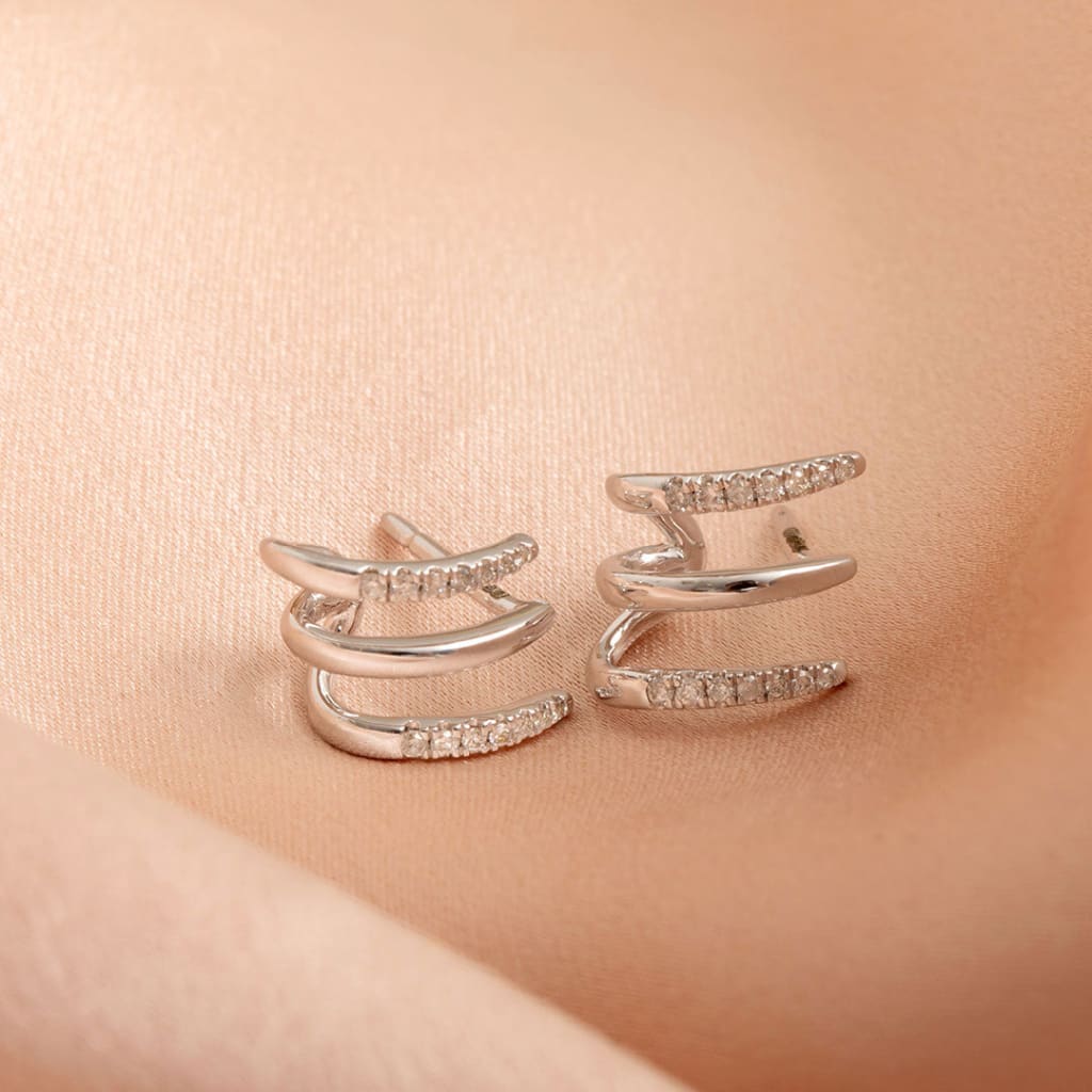 Up close photo of white gold diamond cuff