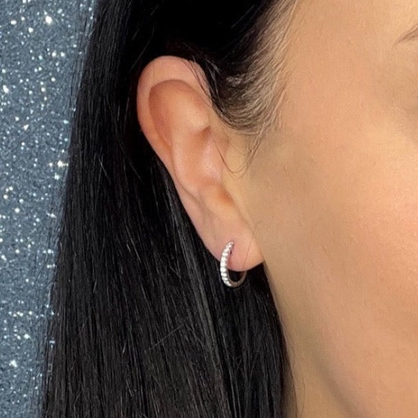 diamond earring on model