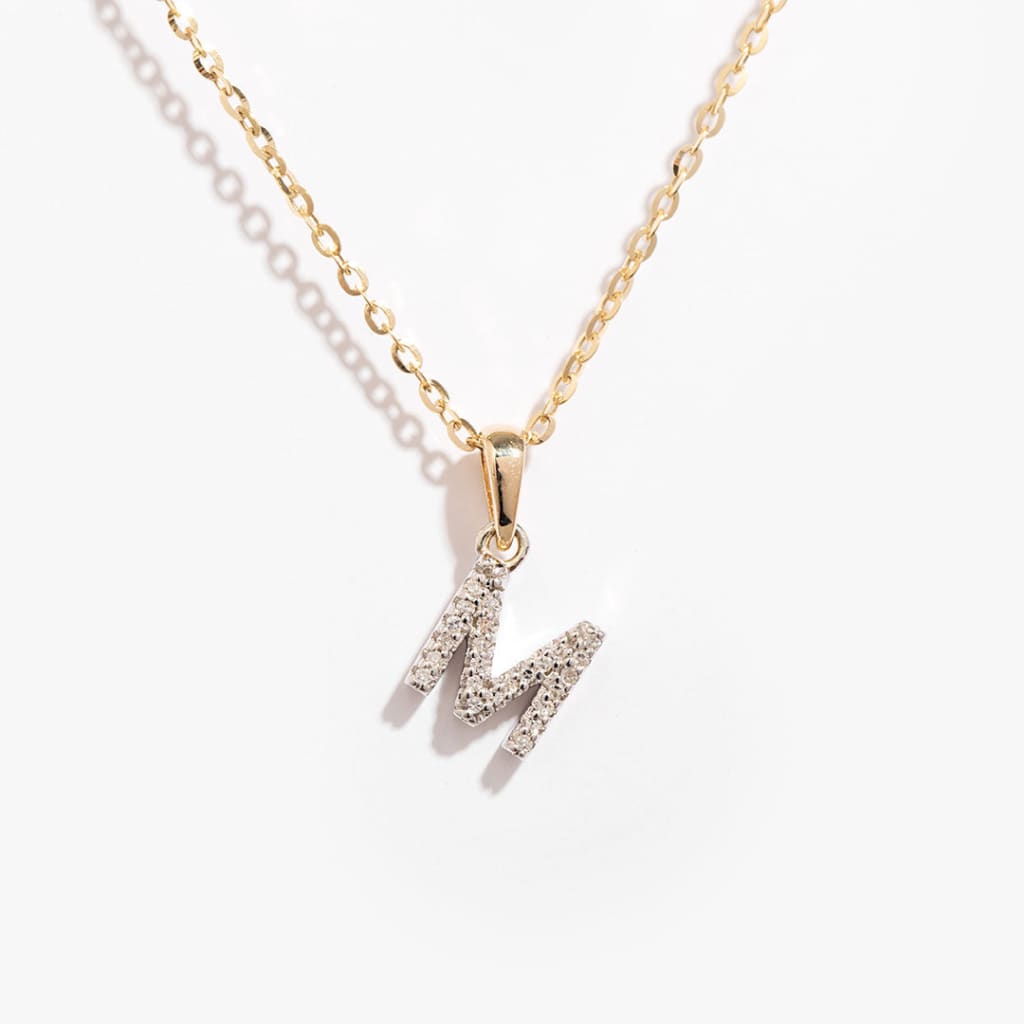 gold 9ct gold diamond M initial pendant