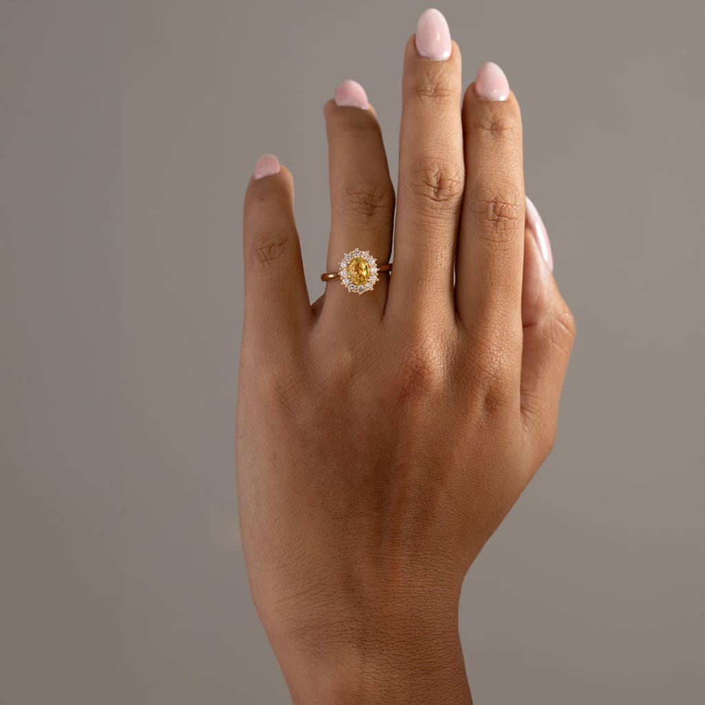 front view of yellow sapphire diamond engagement ring