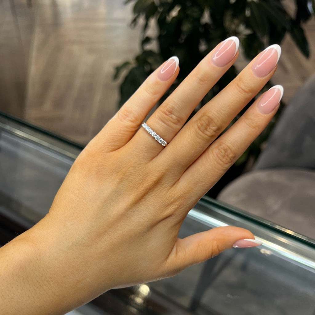 Woman's hand wearing Ivy Eternity Ring