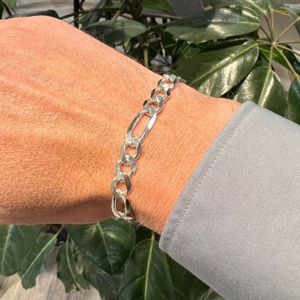 gents sterling silver figaro bracelet on wrist