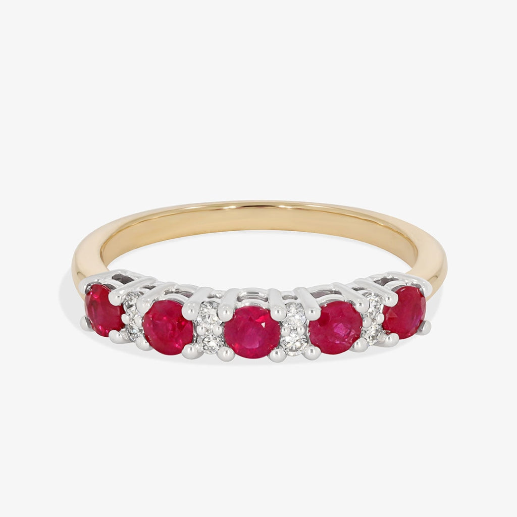 diamond and ruby eternity ring on white background