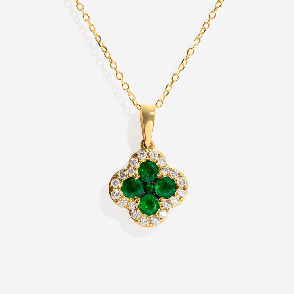 Petite emerald palace necklace on white background