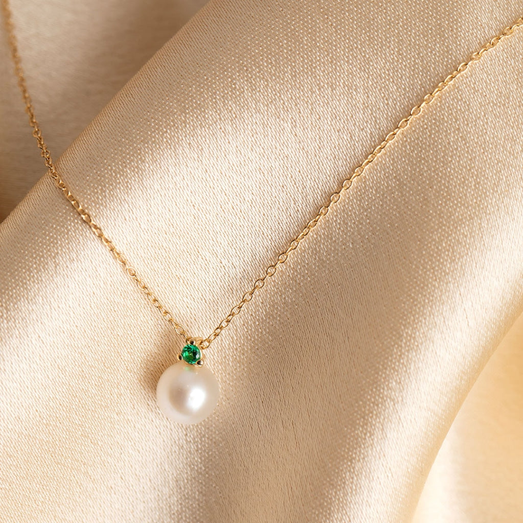 Pearl with green cz on fabric