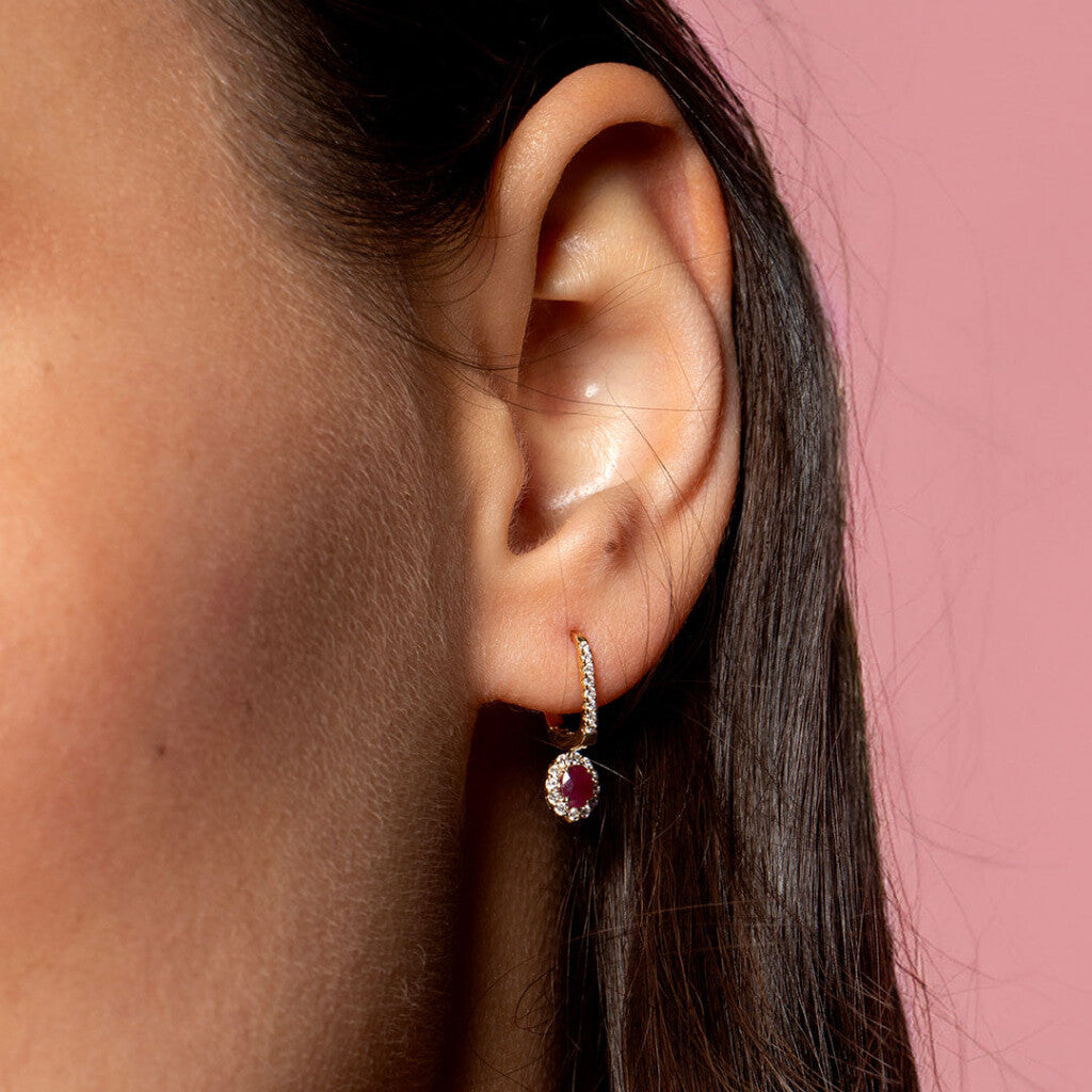 ruby drop earrings on model