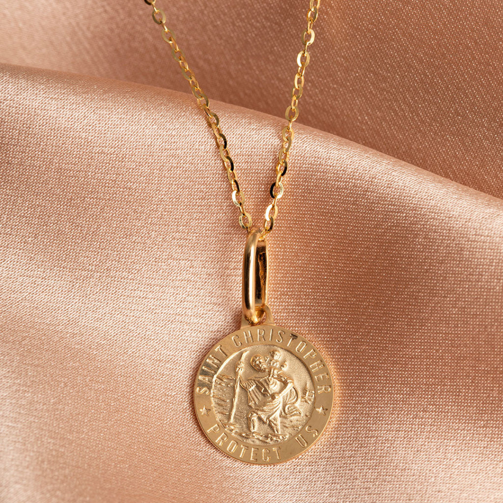 9ct gold medium size St. Christopher medal, with chain.