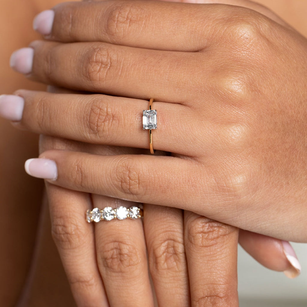 Suki lab grown diamond engagement ring on models hand