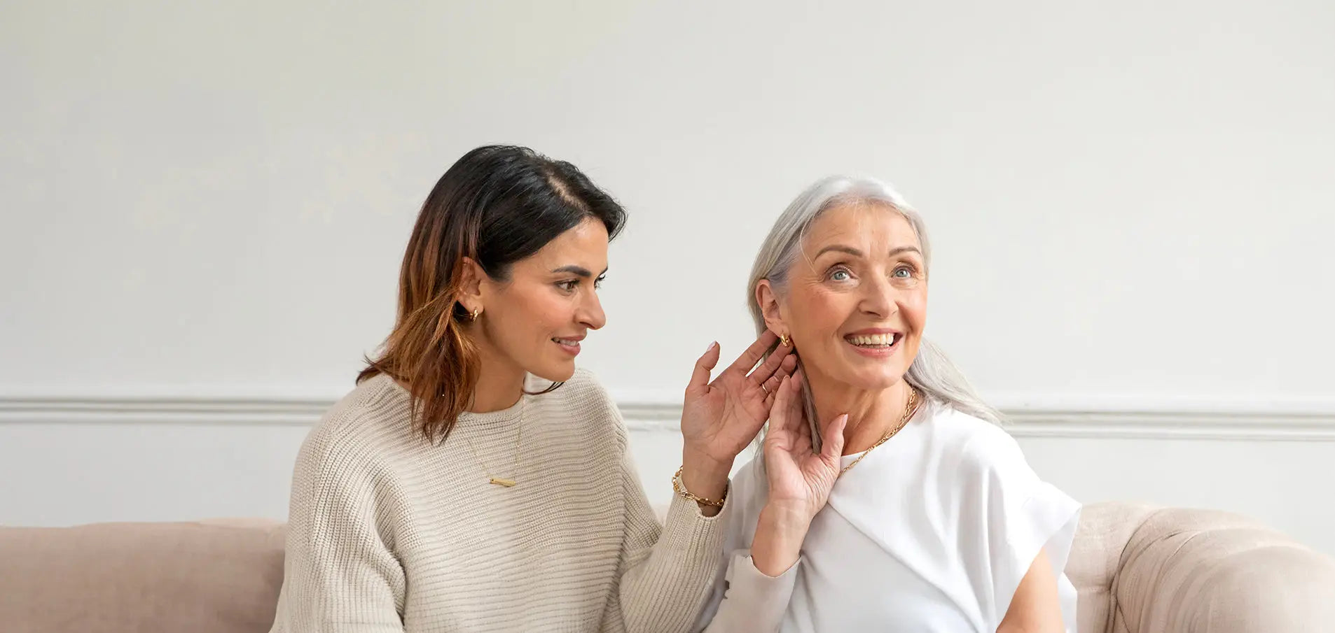 Mother and Daughter exchanging Jewellery