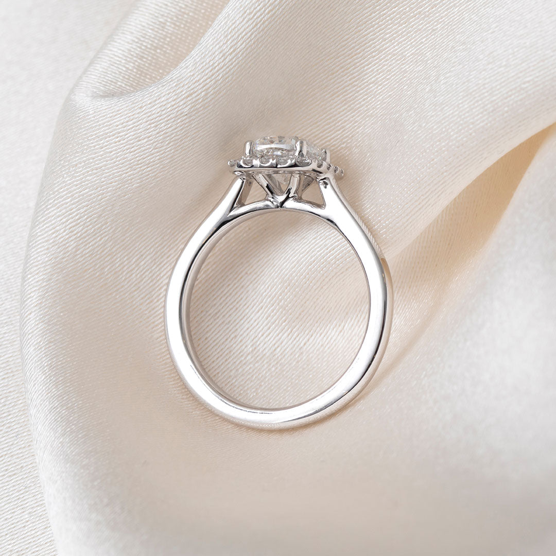 Cushion halo lab grown diamond engagement ring.