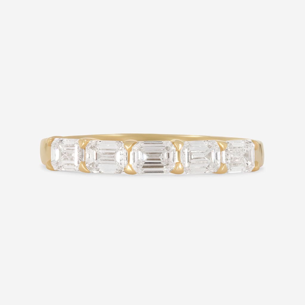 yellow gold emerald cut wedding ring