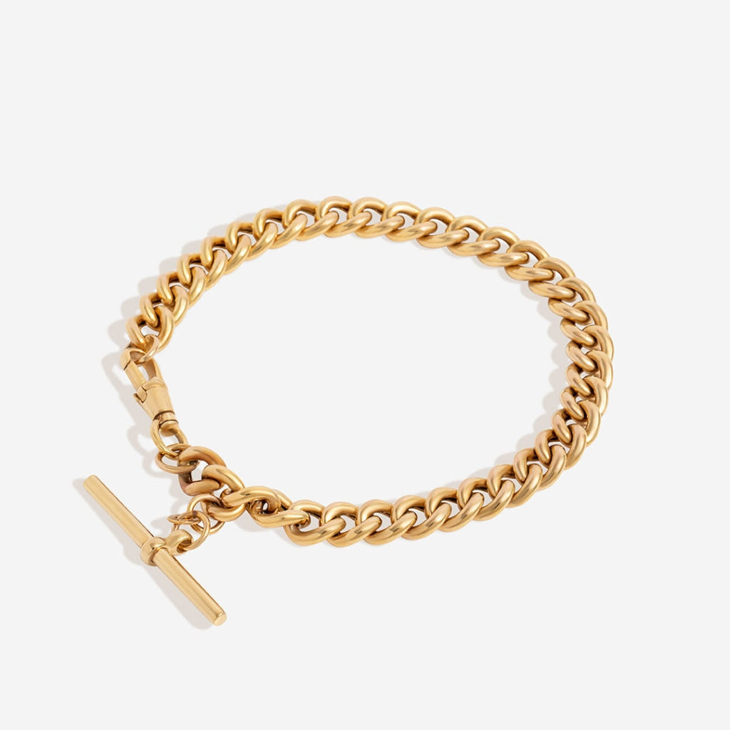 Semi solid curb chain t-bar bracelet on white background