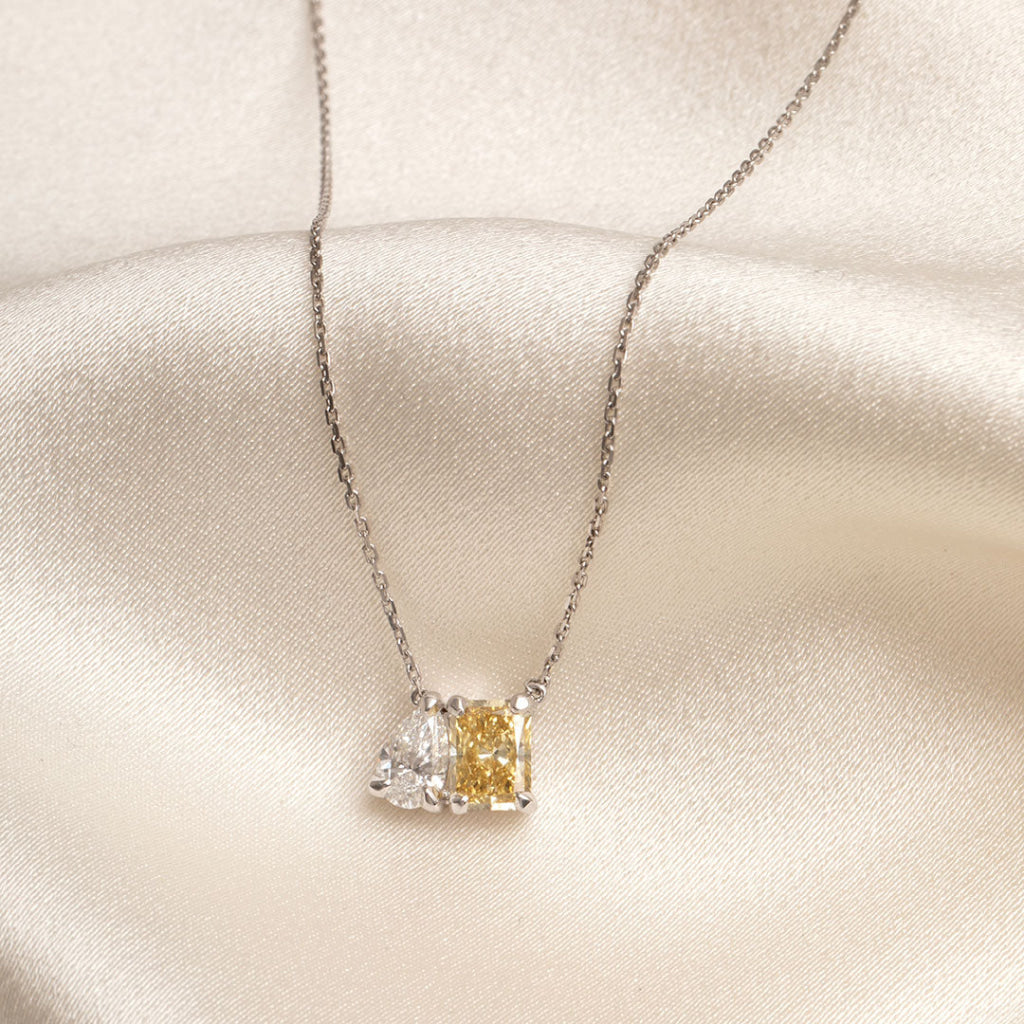 yellow lab diamond and pear cut diamond necklace on fine white gold trace chain