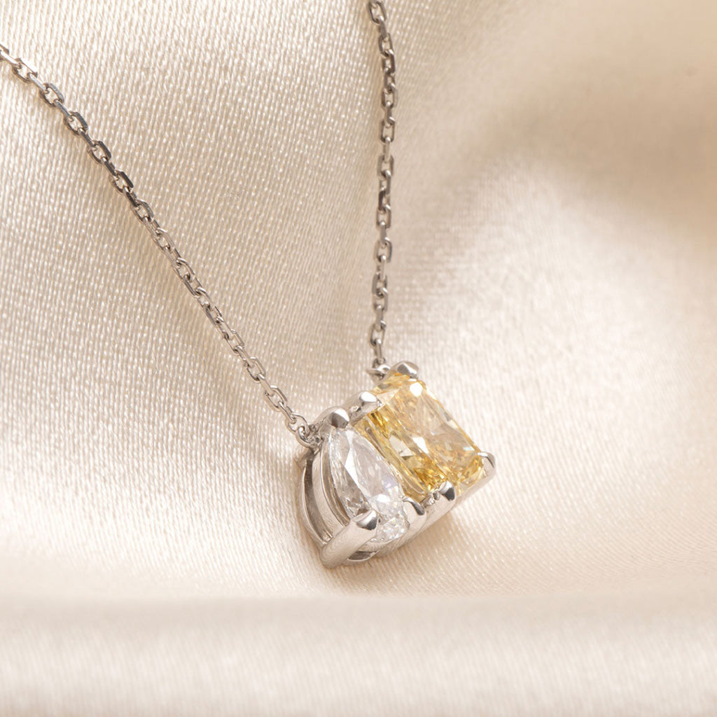 side view of fancy yellow lab diamond necklace