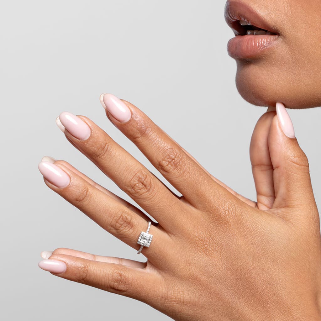 Woman's hands wearing Amber Diamond Engagement Ring