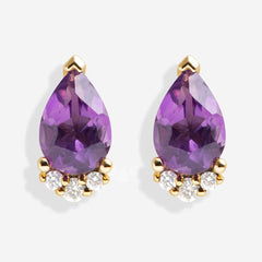amethyst crown earrings on white background