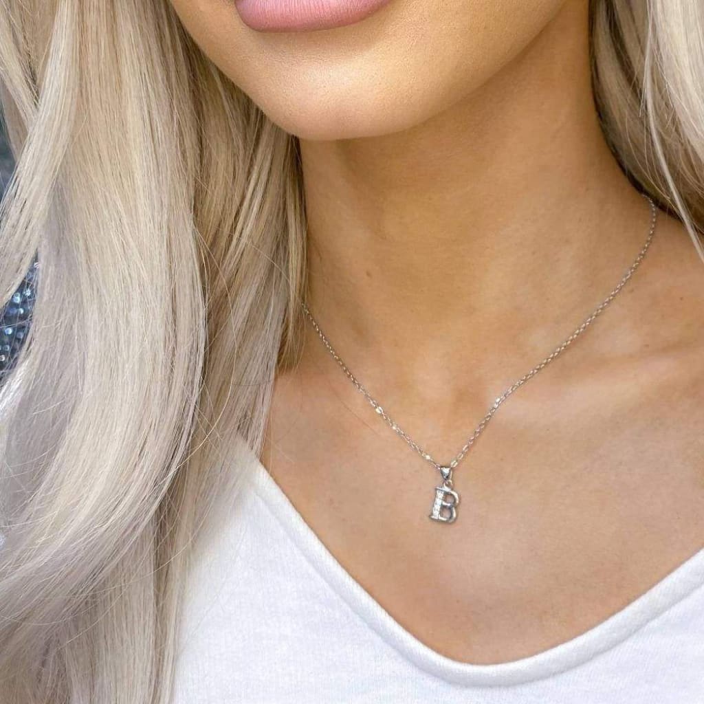 Woman wearing Sterling Silver B Initial Necklace