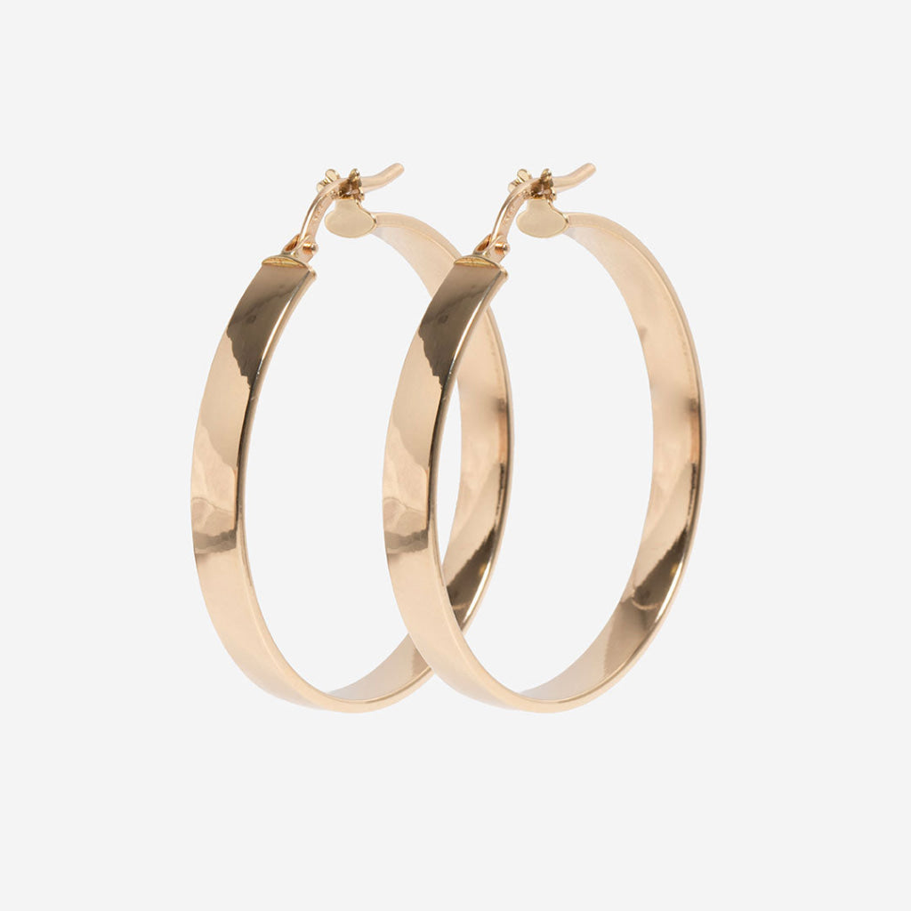 30mm 14ct yellow gold hoops on a white background