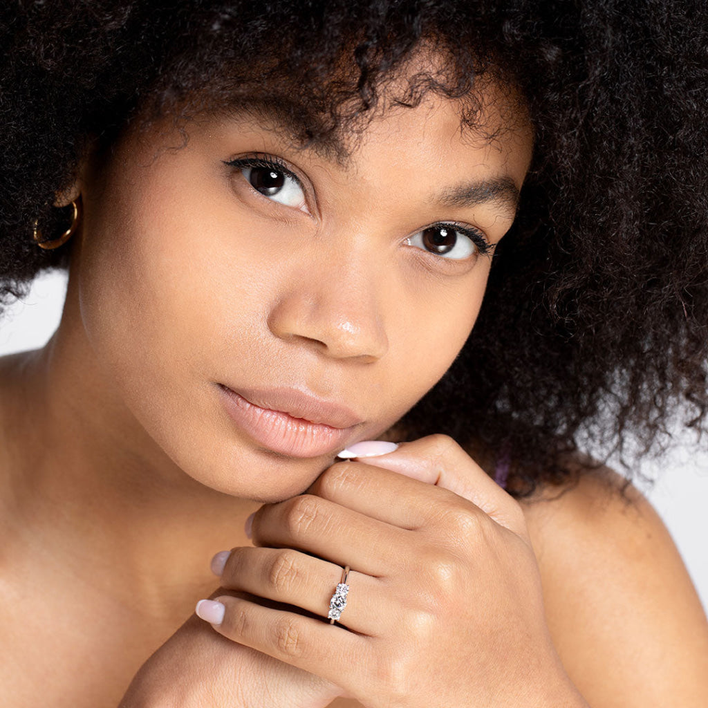 model wearing bayberry 3 stone engagement ring close up
