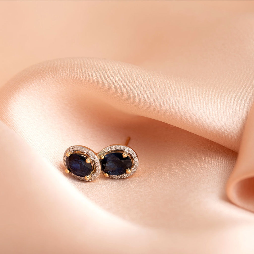 dia sapphire earring on fabricc