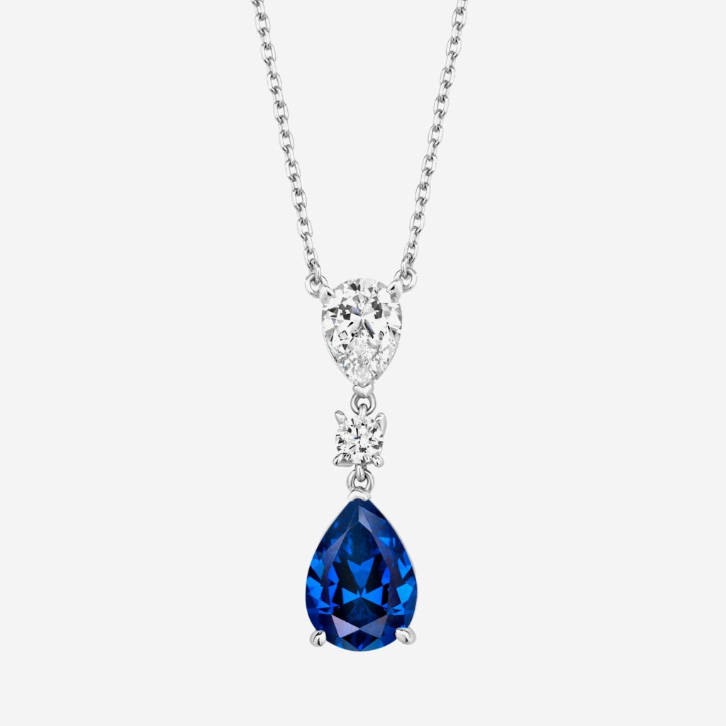 blue pear drop necklace on  white background