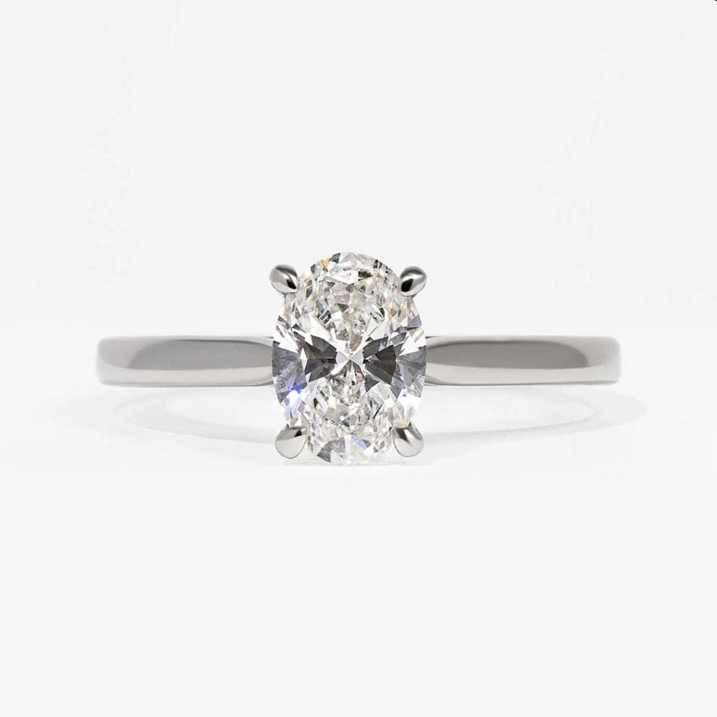 Platinum natural diamond solitaire on grey background