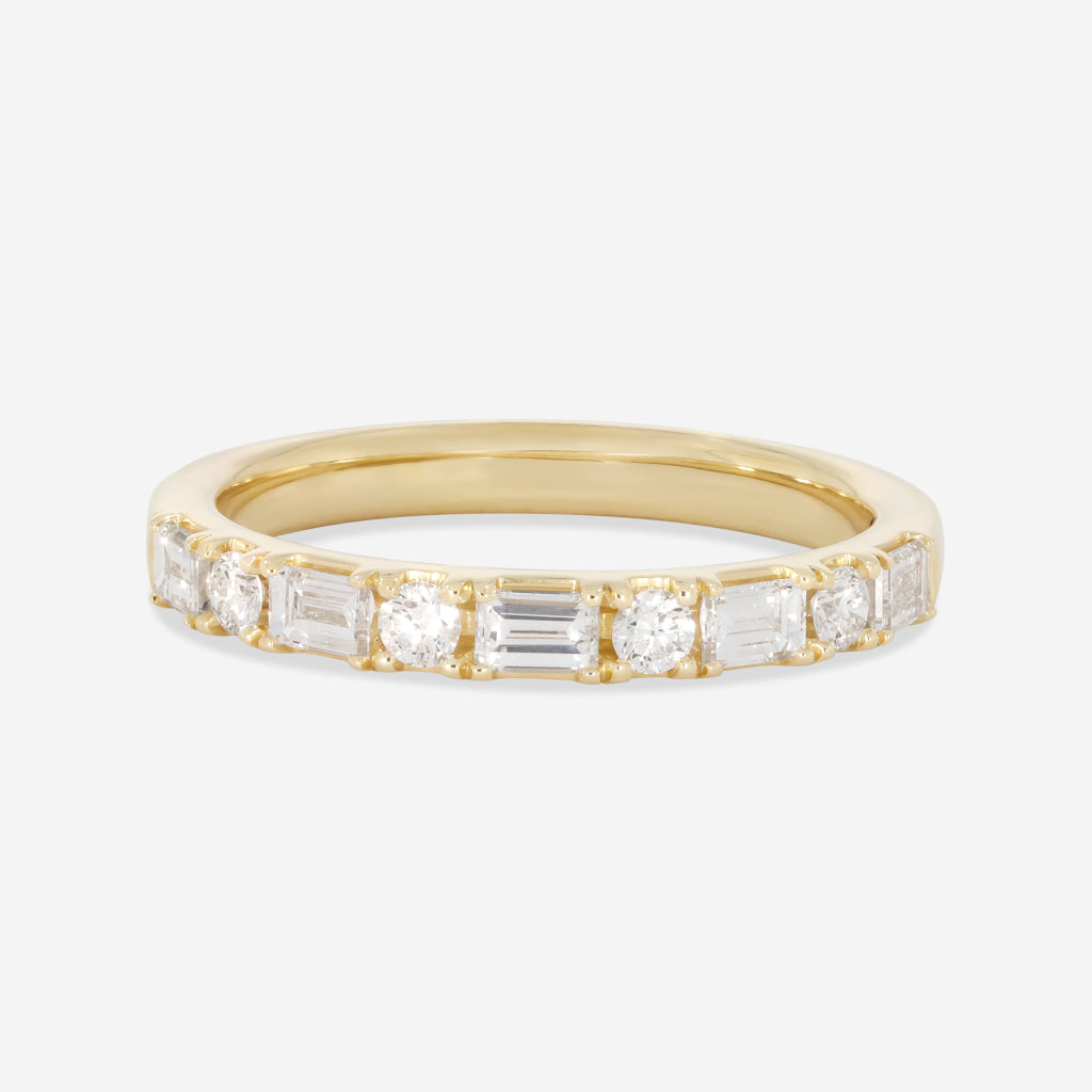 yellow gold wedding ring on white background
