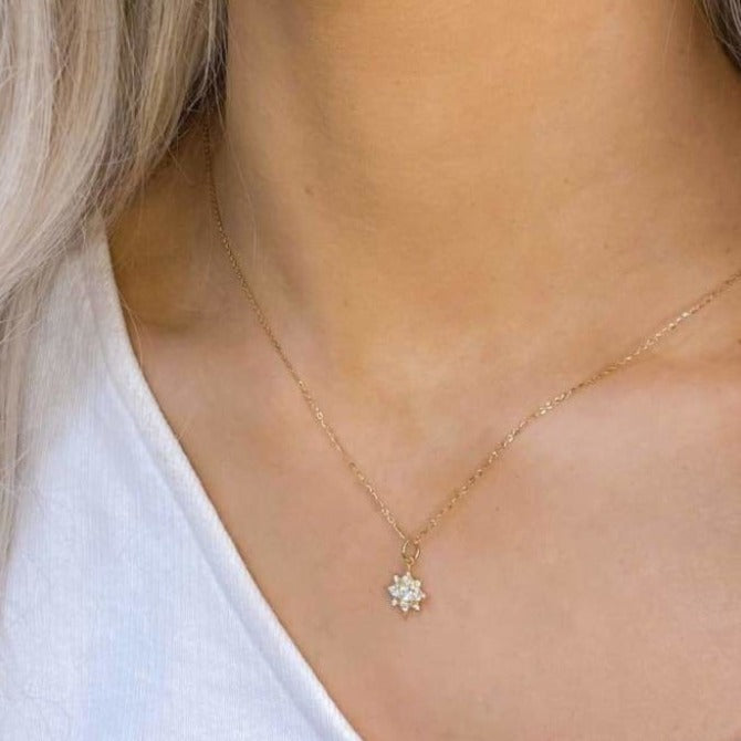 Woman wearing 9ct Gold Star Necklace