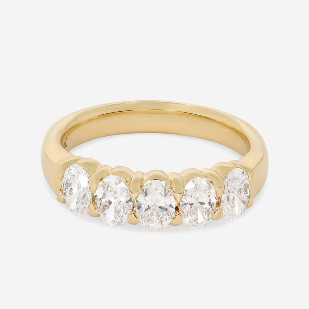 oval cut eternity ring set in 18ct yellow gold