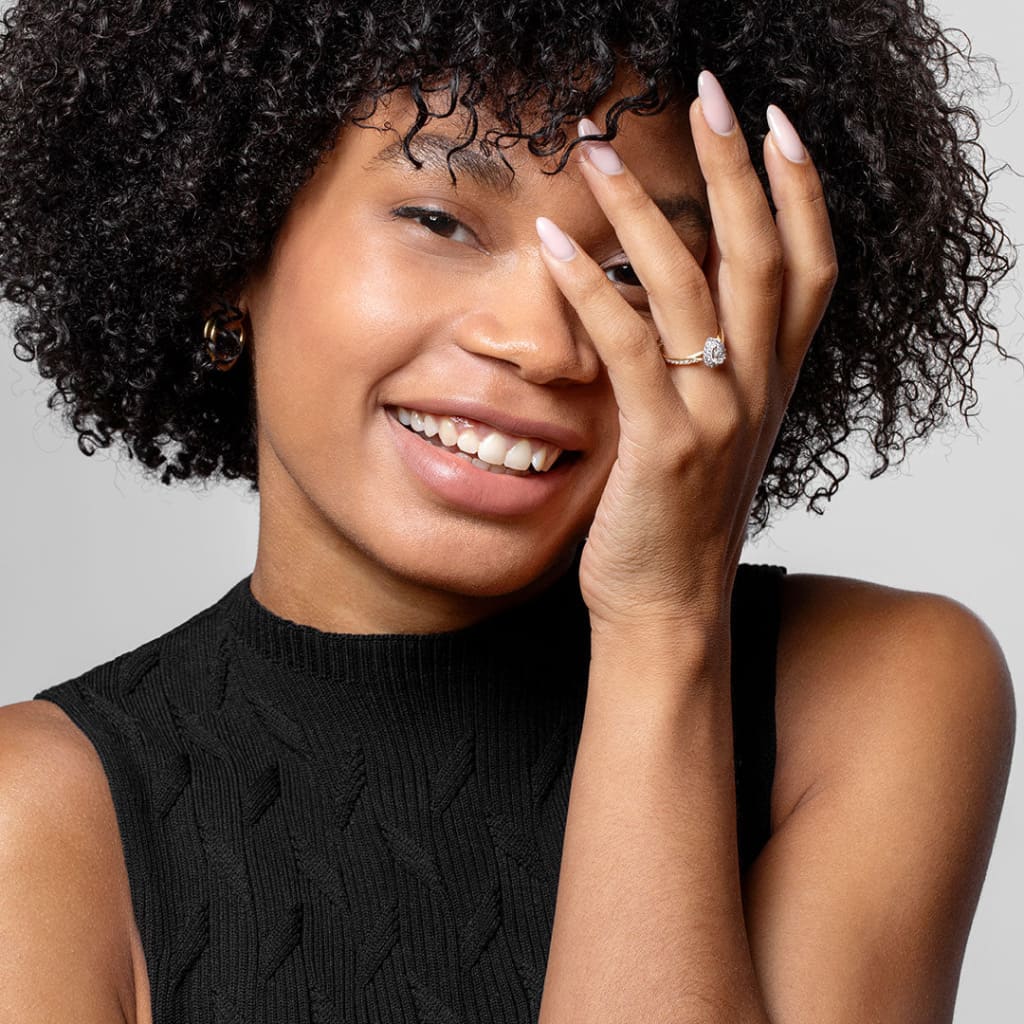 Model in black top wearing Caitriona Diamond Engagement Ring - Photo 2