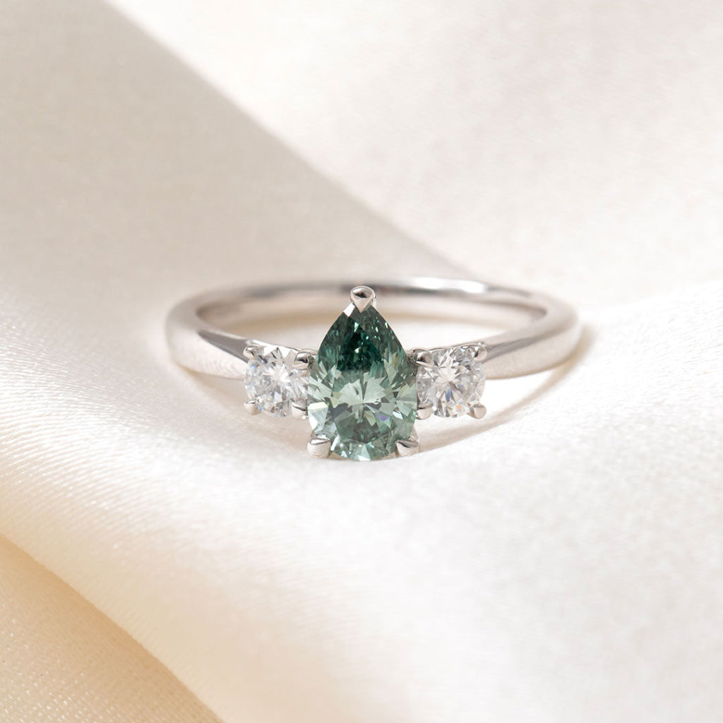fancy blue green three stone ring