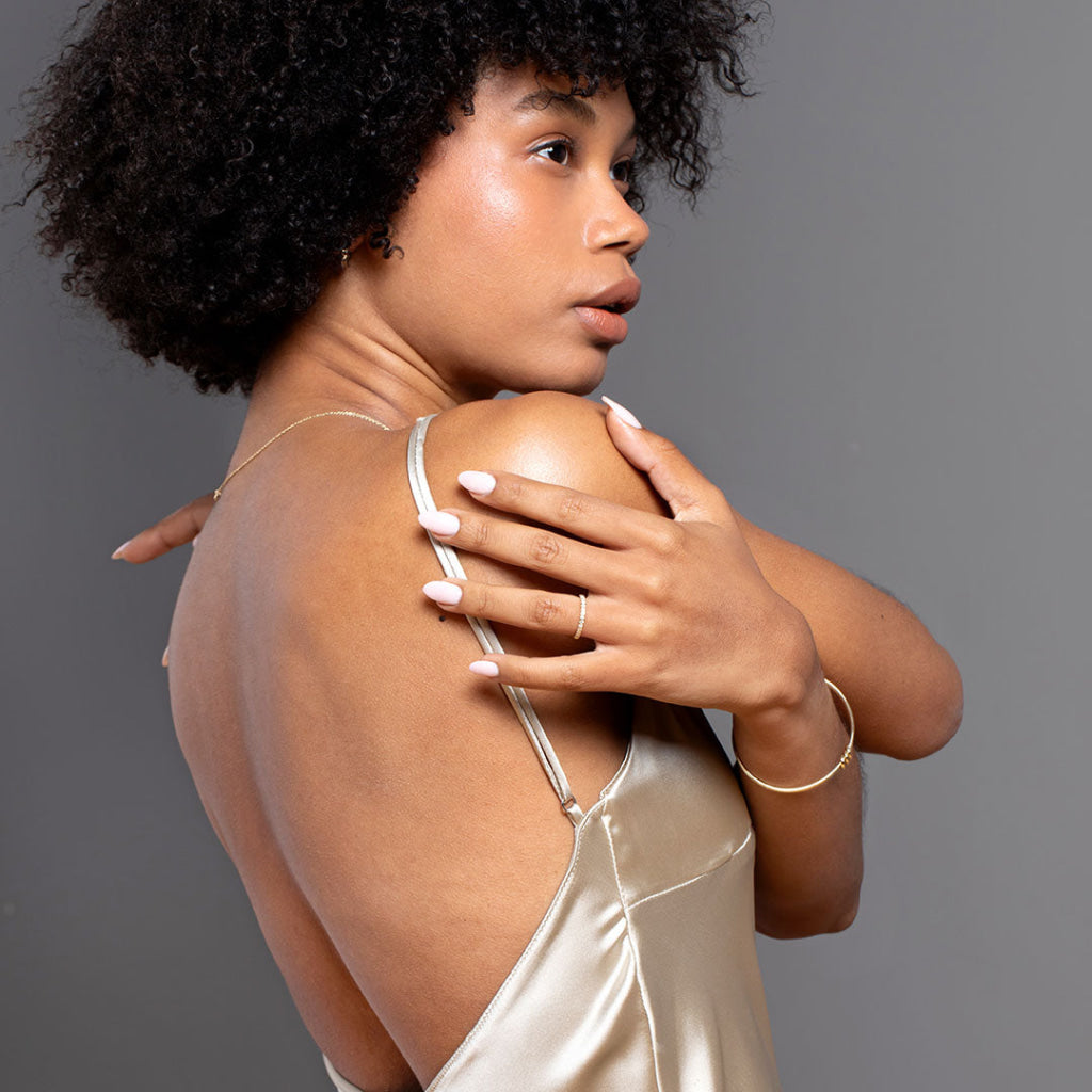Model wearing Castille 2mm diamond wedding band - Photo 1