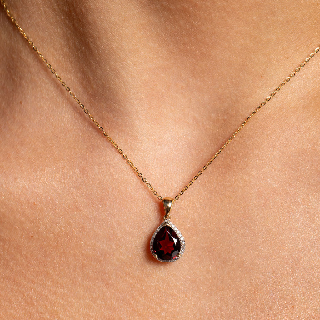 Front image of garnet necklace on model