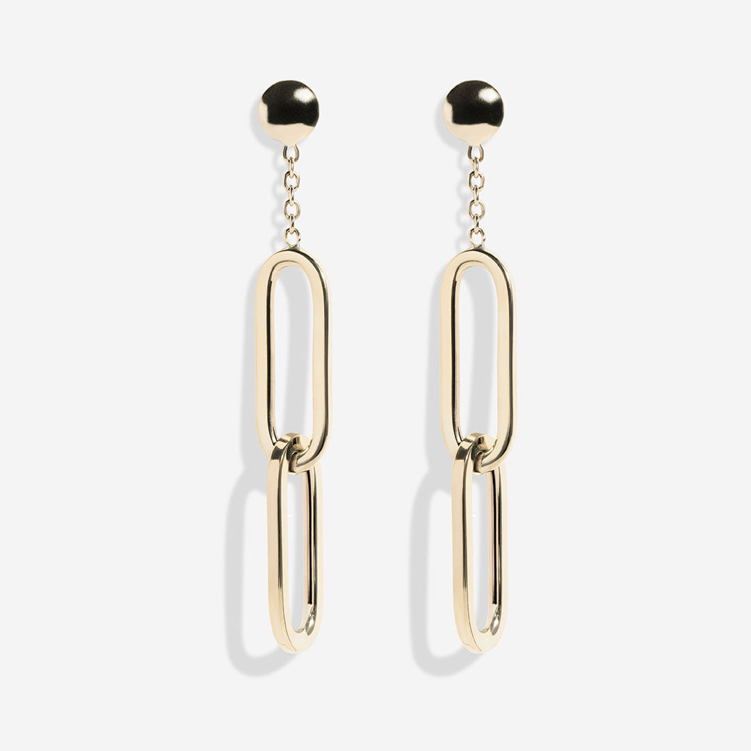 Chain drop earrings on white background