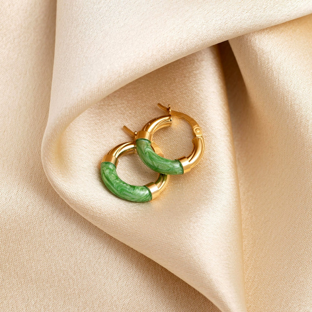 Gold hoop earrings with a green enamel finish 1