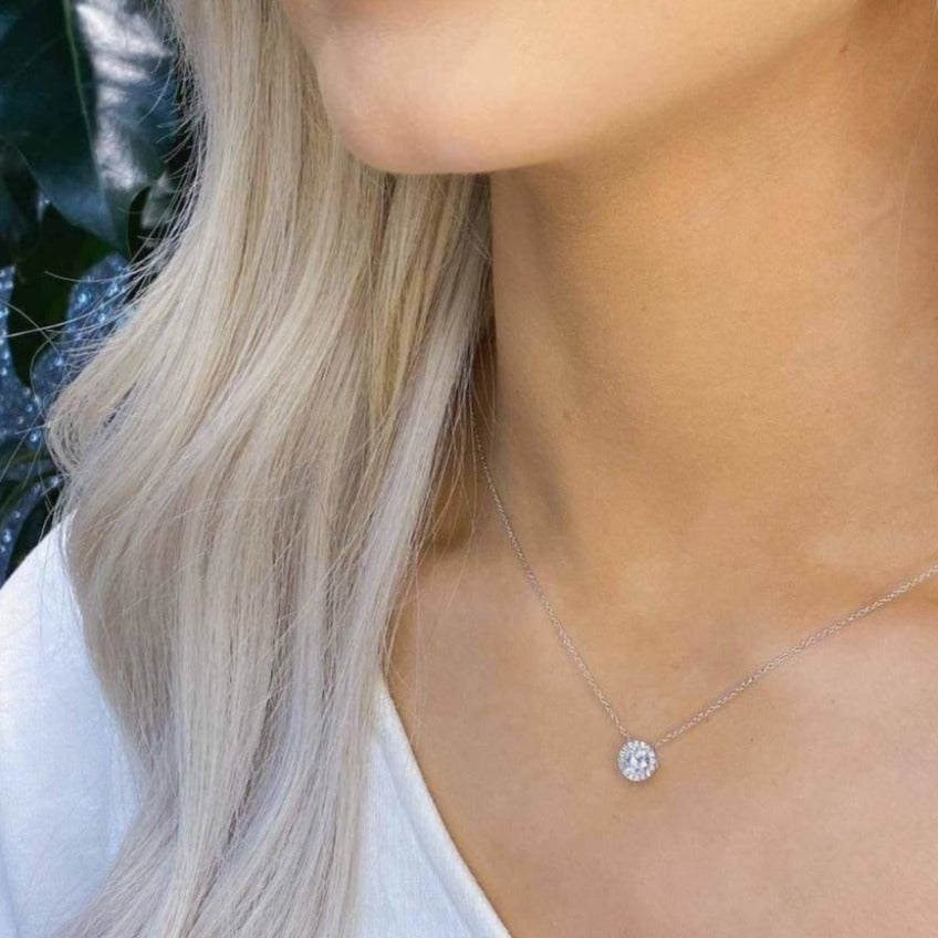 Woman wearing 9ct White Gold Round Halo Necklace