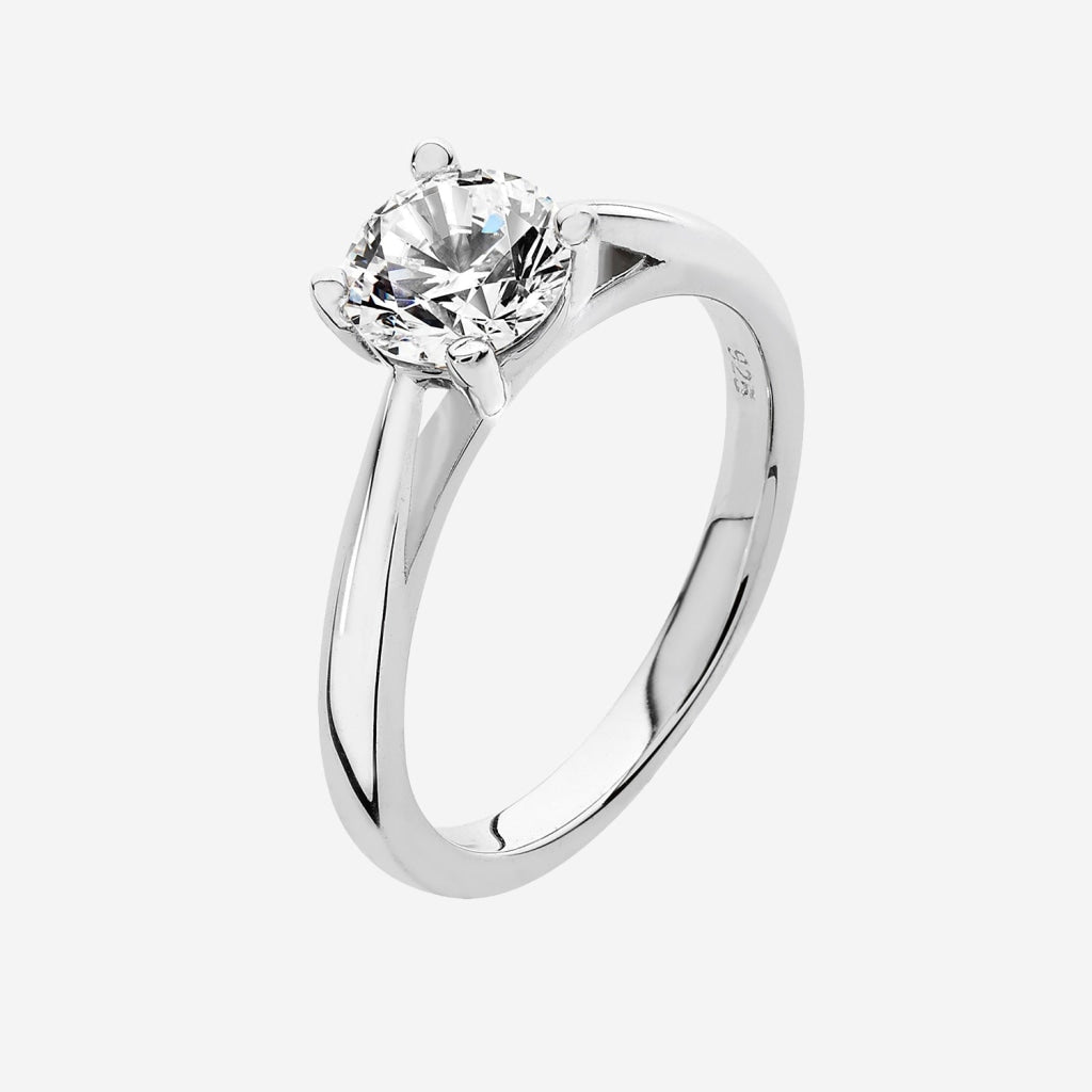 Sterling silver 4 claw cz ring
