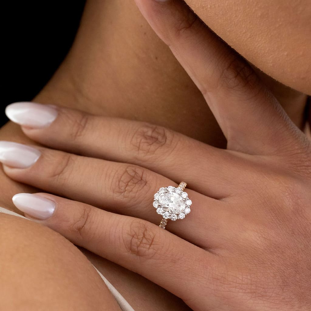 diamond engagement ring on models hand