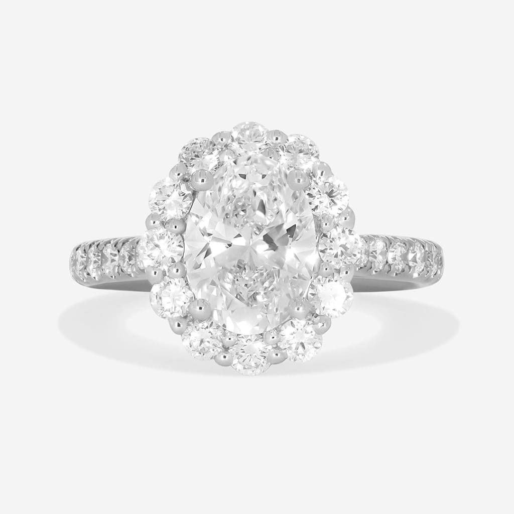 oval diamond halo engagement ring front view