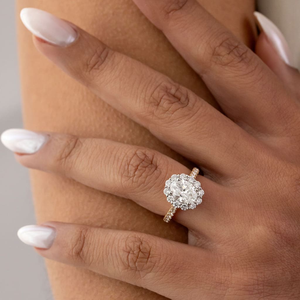 diamond engagement ring on models hand