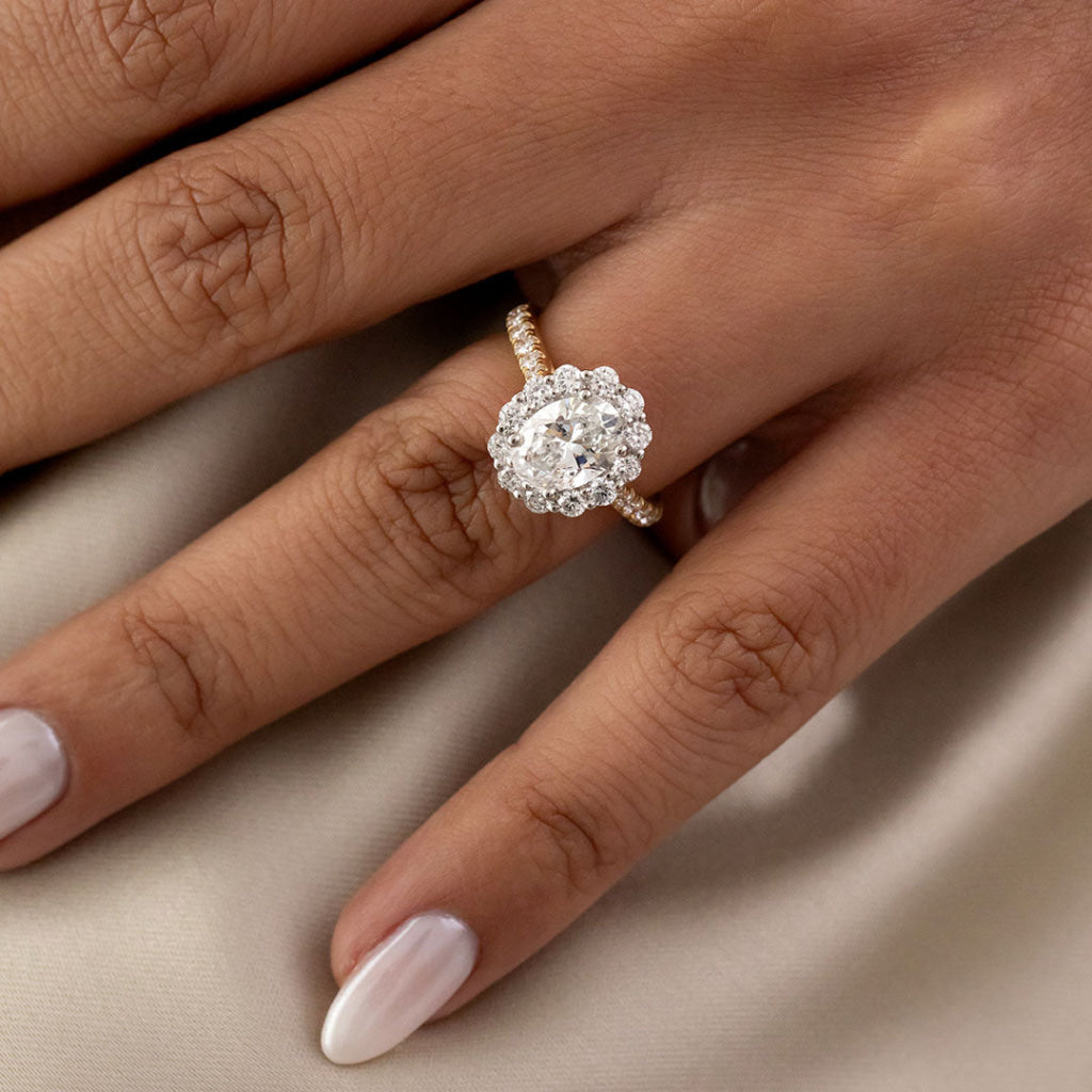 diamond engagement ring on models hand