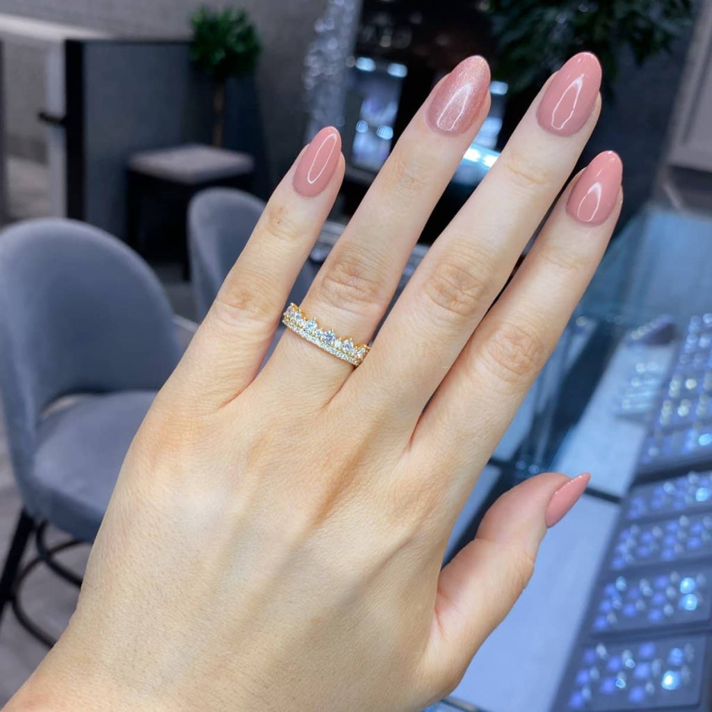 Crown Diamond Eternity Ring on a woman's hand.