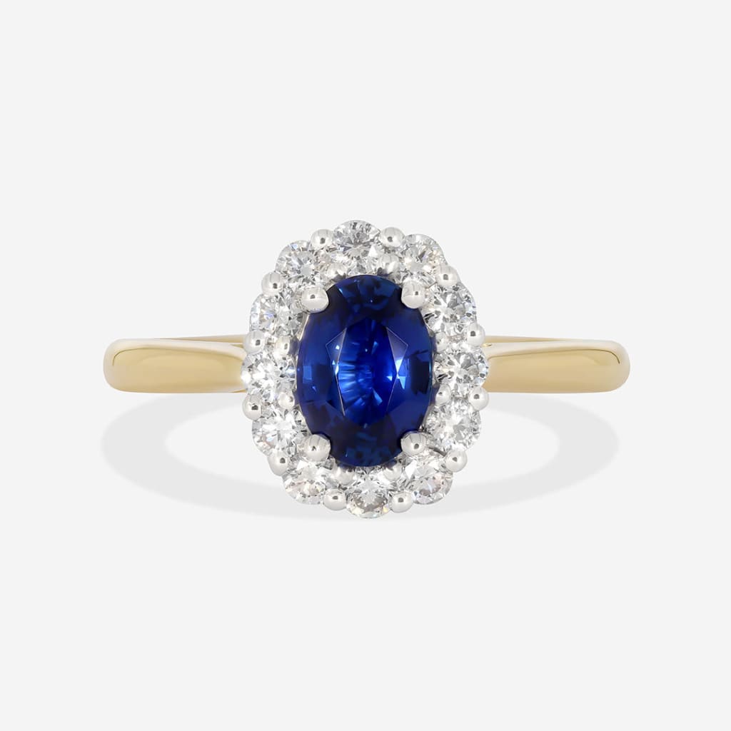 oval sapphire and halo diamond engagement ring