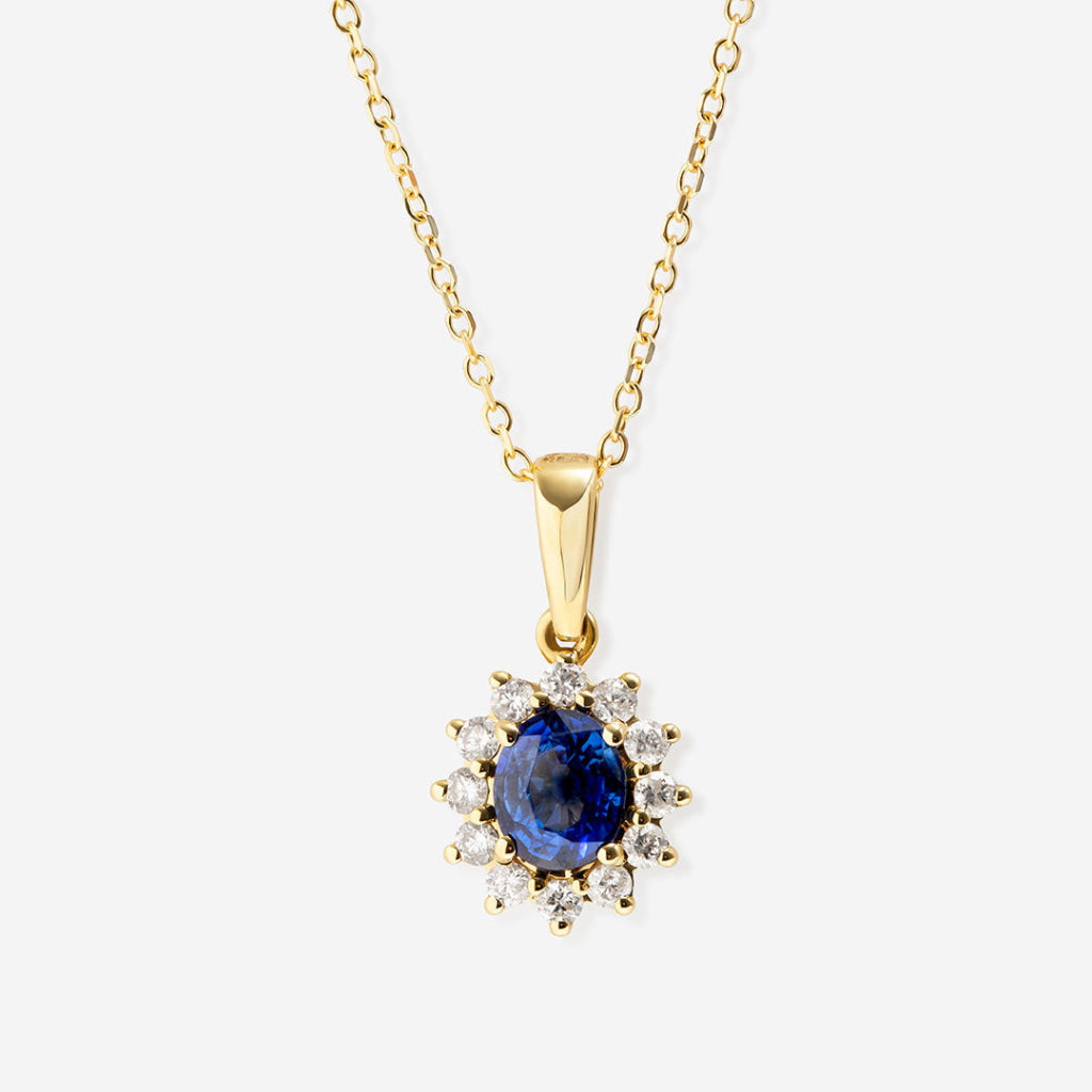 diamond and sapphire necklace on white background