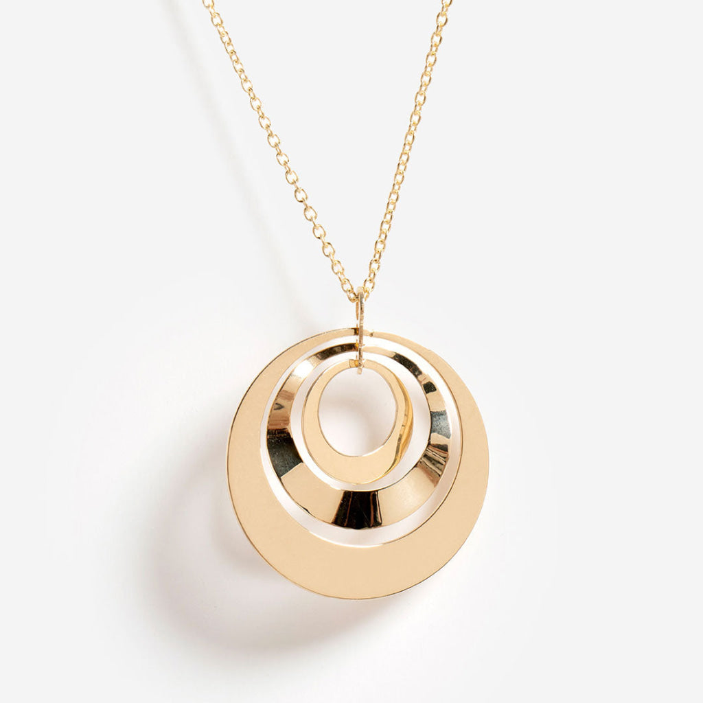 14ct gold multi-disc pendant on a white background