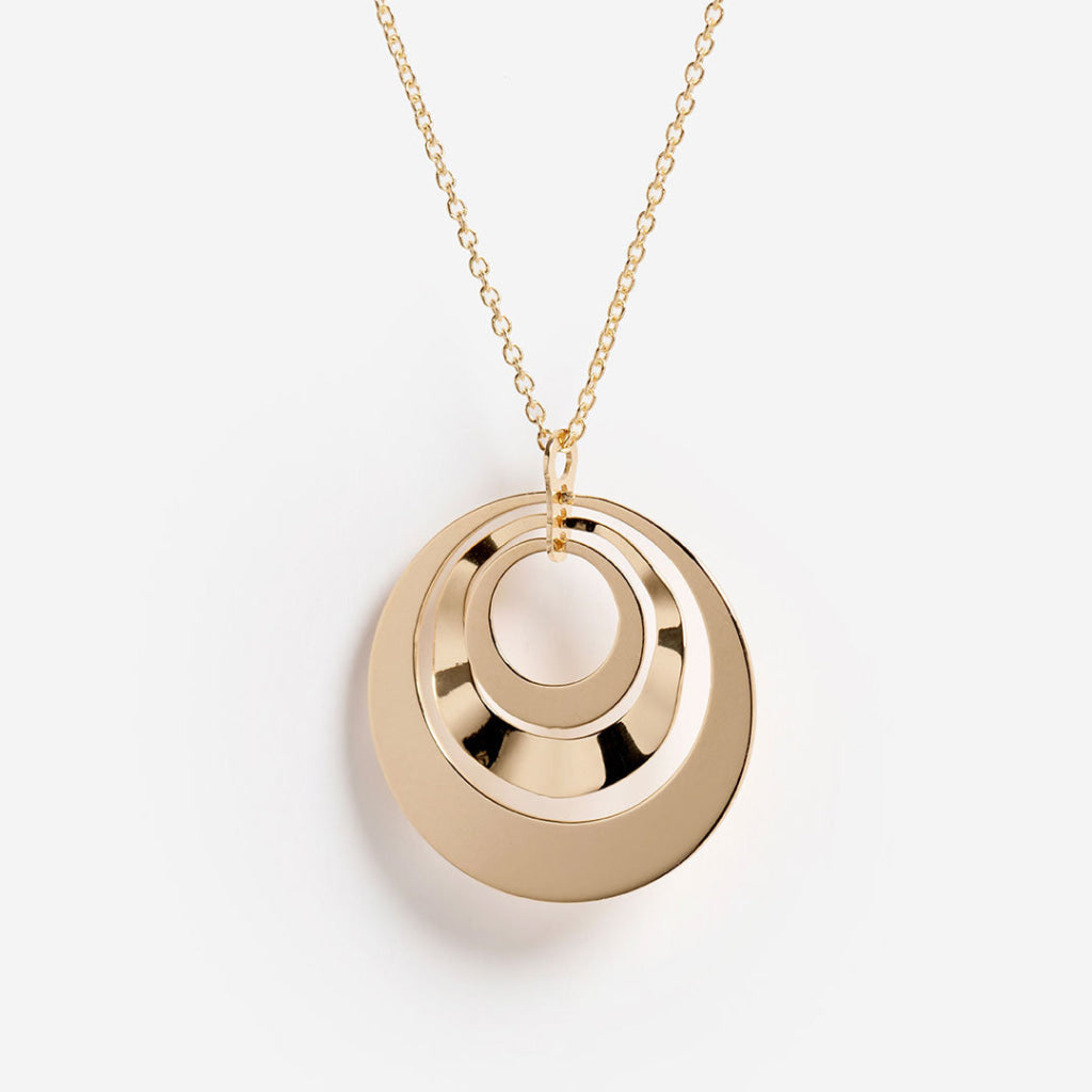 14ct gold multi disc pendant on a white background